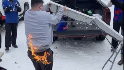 Fan jumps through flaming table at Buffalo Bills tailgate